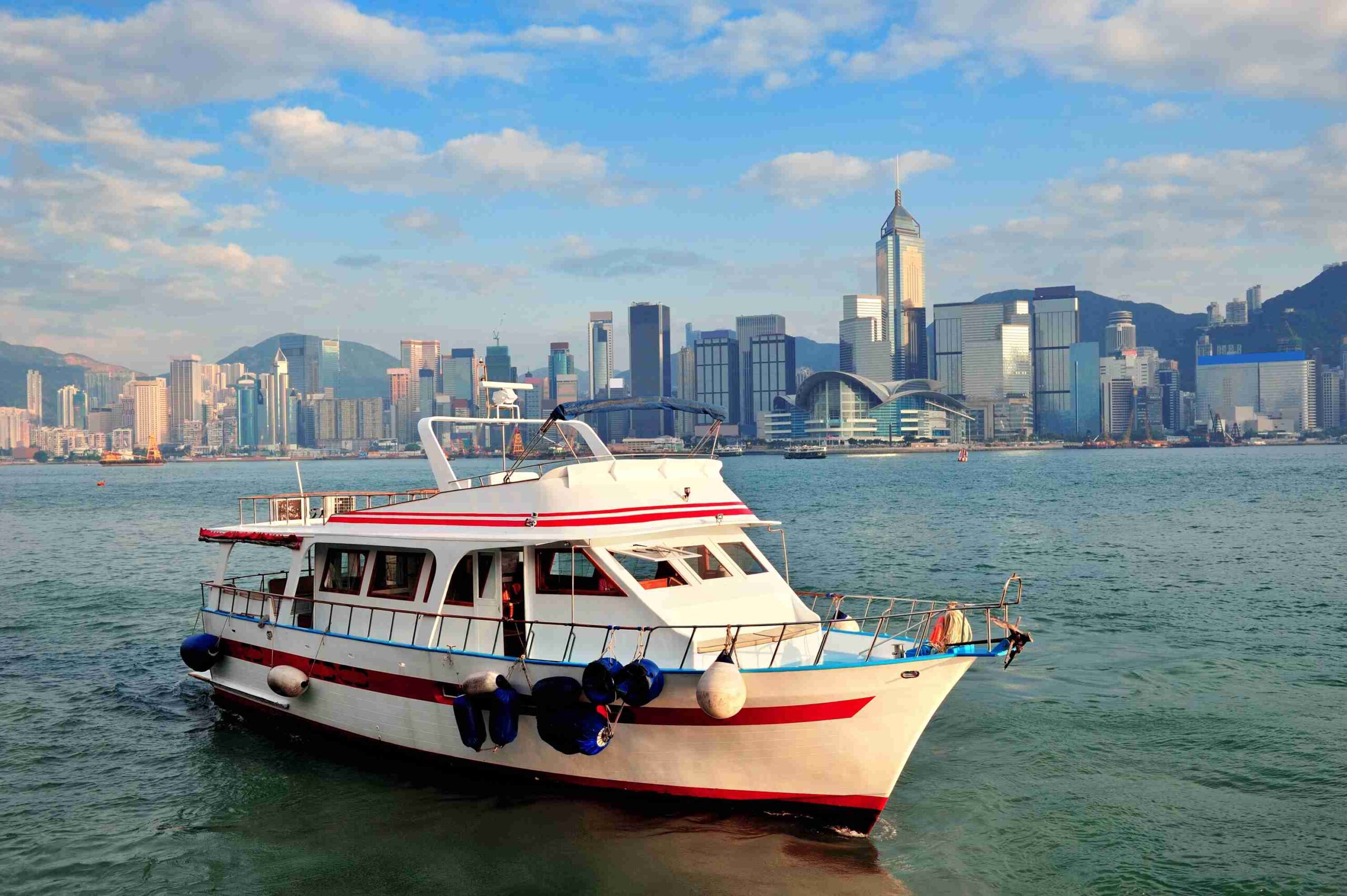 ferry boat docked at a pier, ready to load passengers